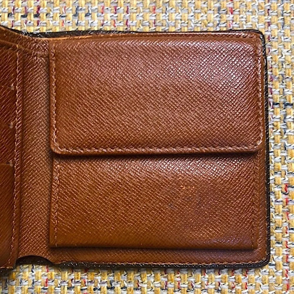 LOUIS VUITTON LV Monogramed Bifold Wallet CA0092 COMES WITH: LV Dust Bag